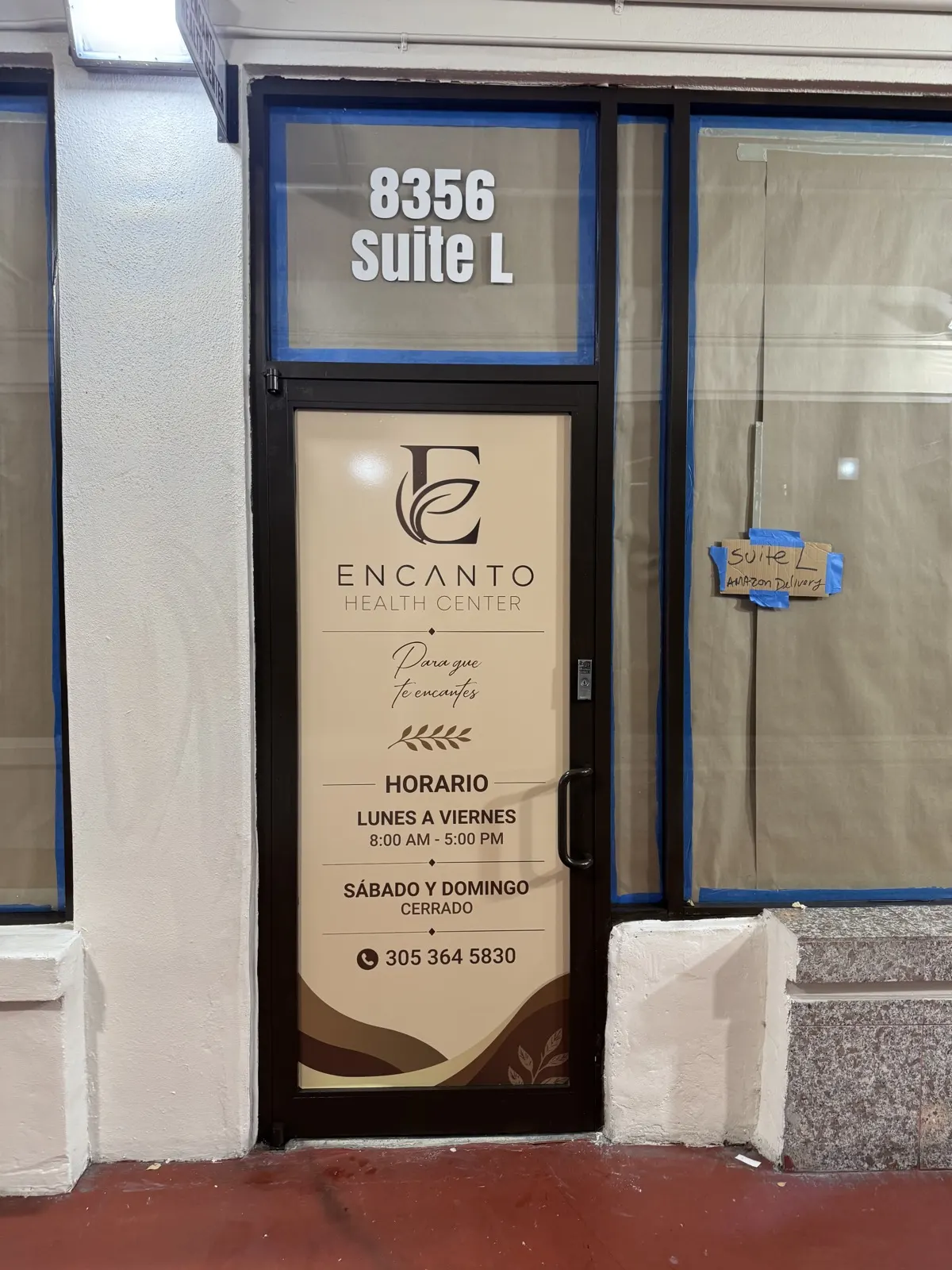 Encanto Health Center door signage