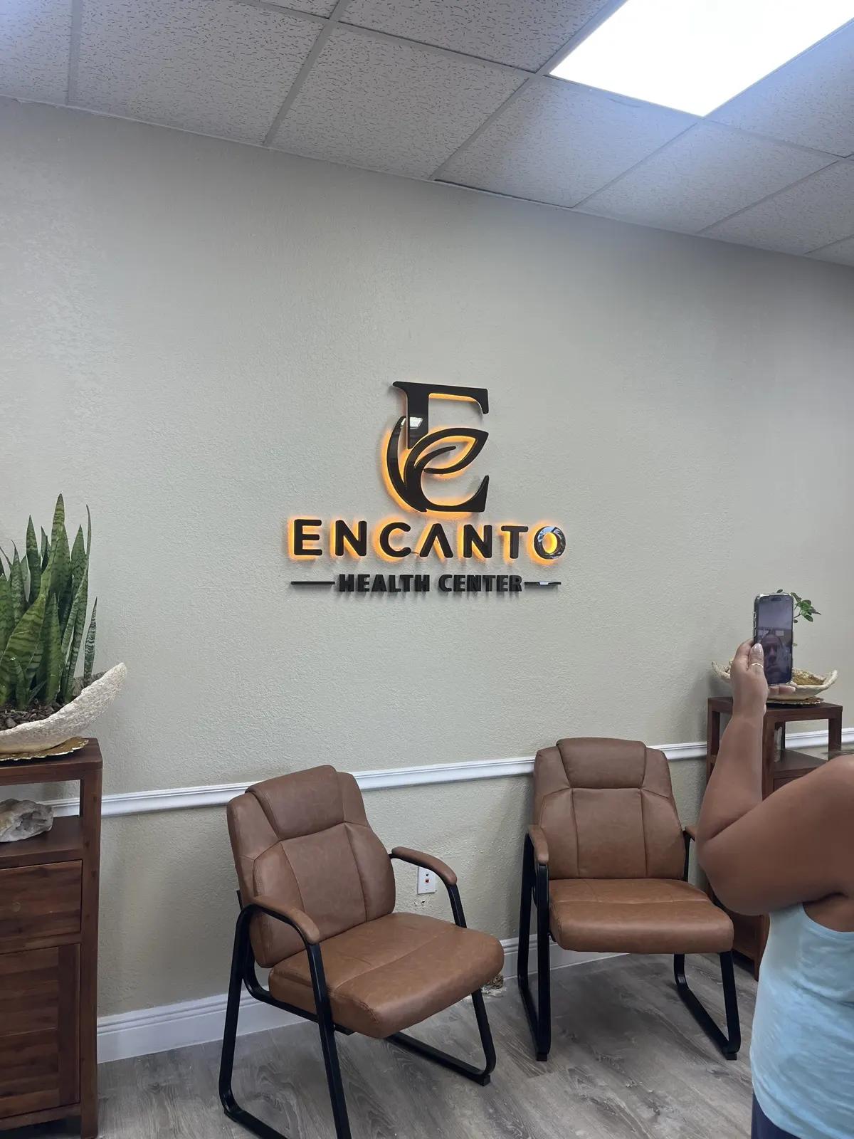 Backlit Encanto Health Center wall sign